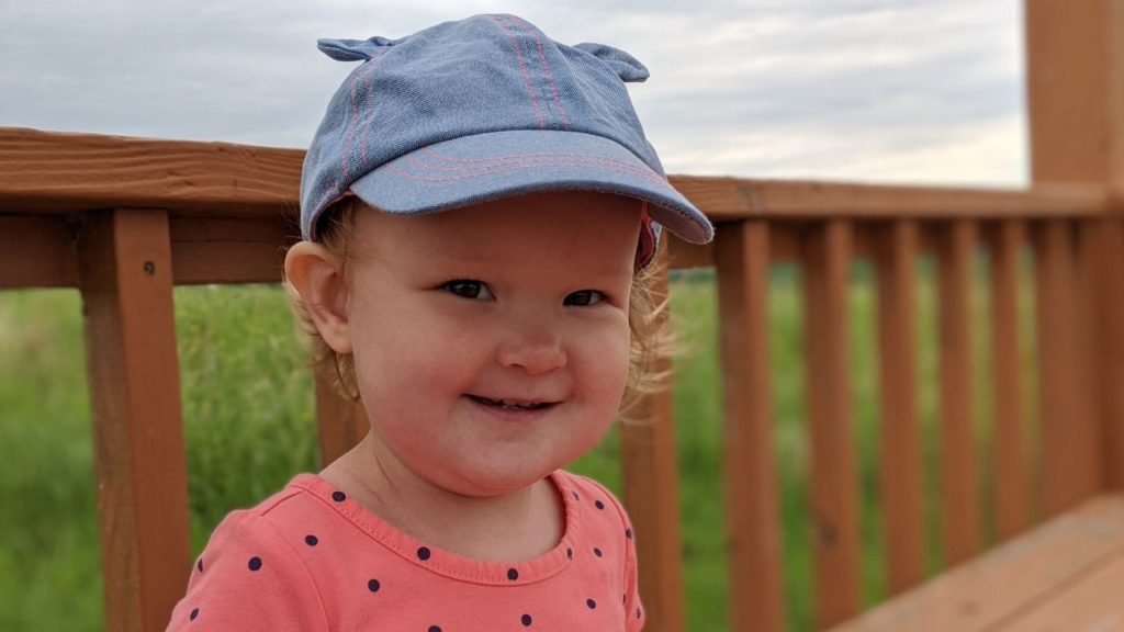 photo of my baby with her sunhat on