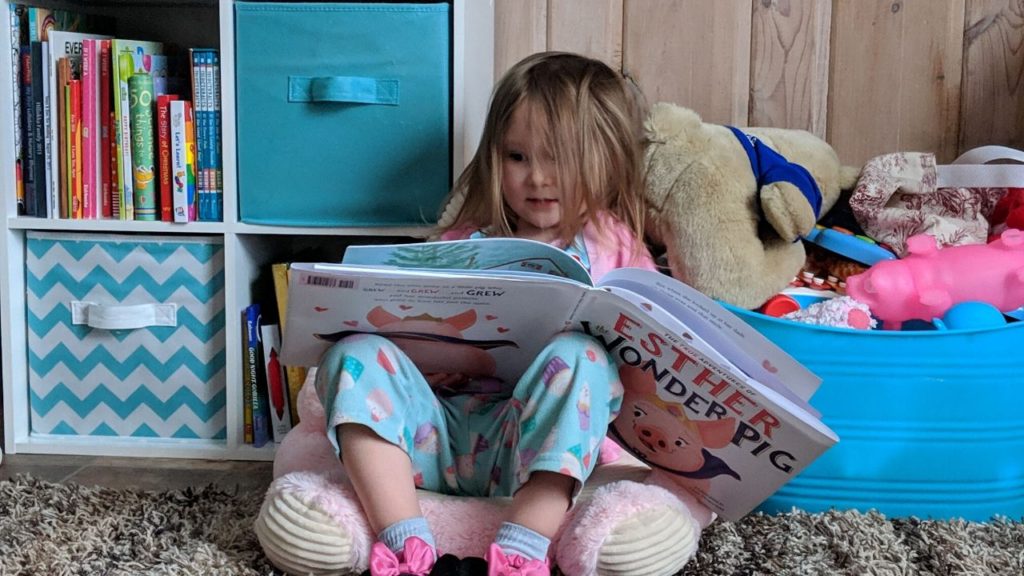 photo of my child reading | children's reading nook corner