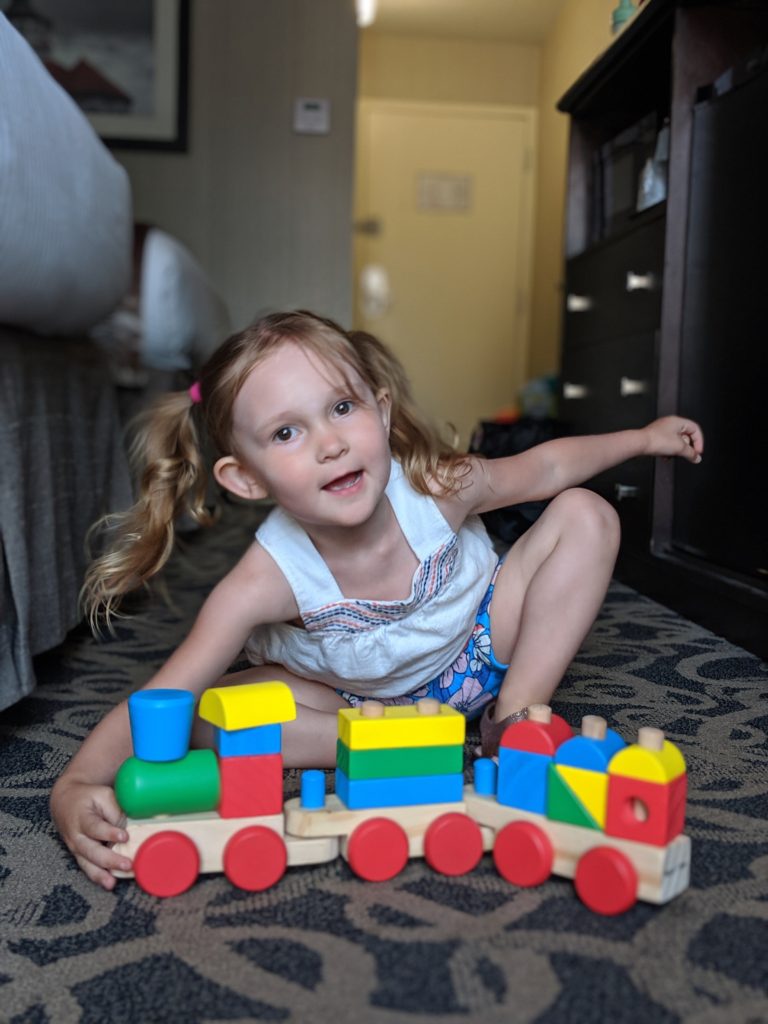 image of toddler in a hotel room