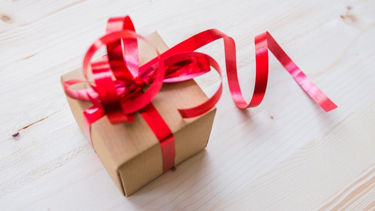 gift wrapped with red ribbon