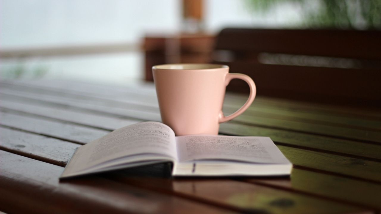 journal and coffee mug